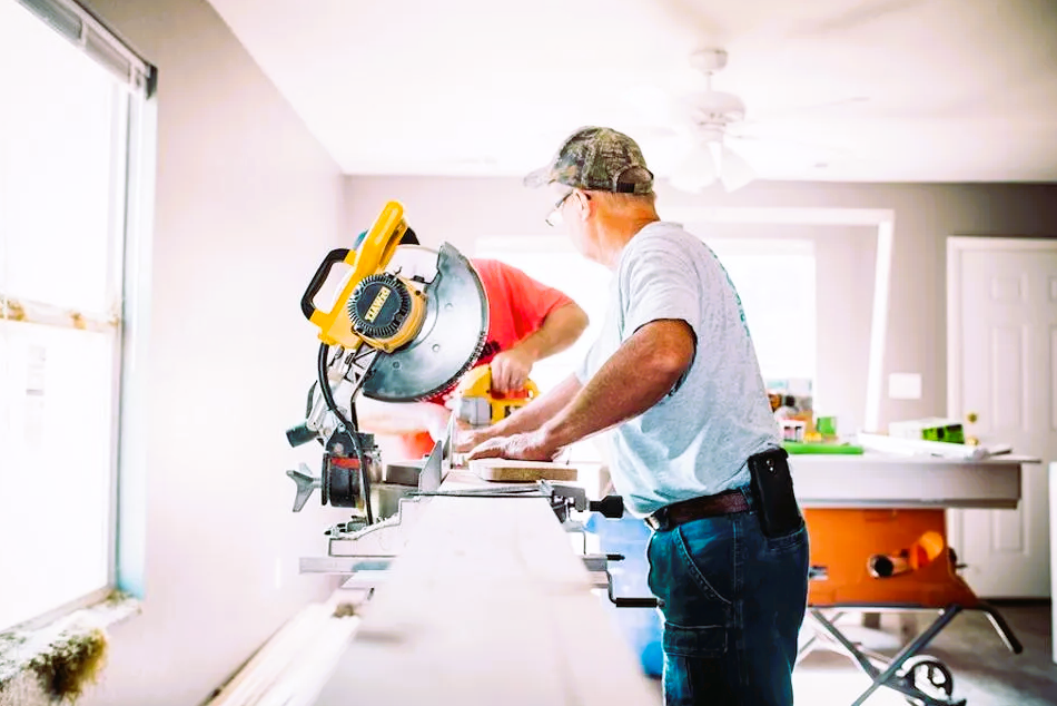 Professionals fixing the house